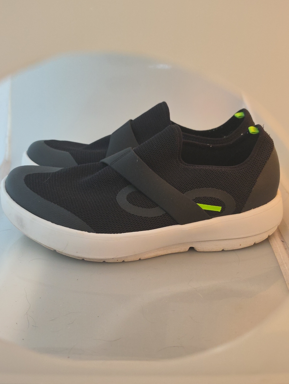 OOFOS Black Slip-On Sneakers with Neon Green Accents